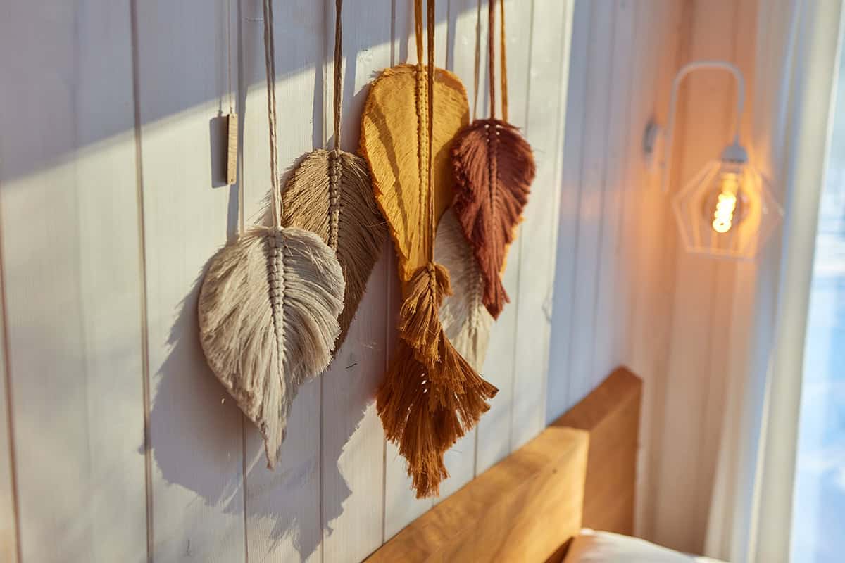 Many Macrame feather wall hangings
