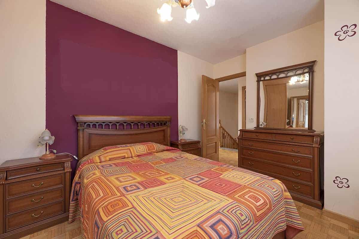 Deep Purple Accent With Warm Beige Walls