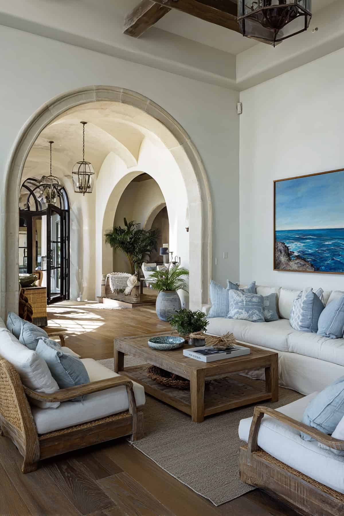 Arched Doorways with Soft Blue Decor and Elegant Coastal Styling
