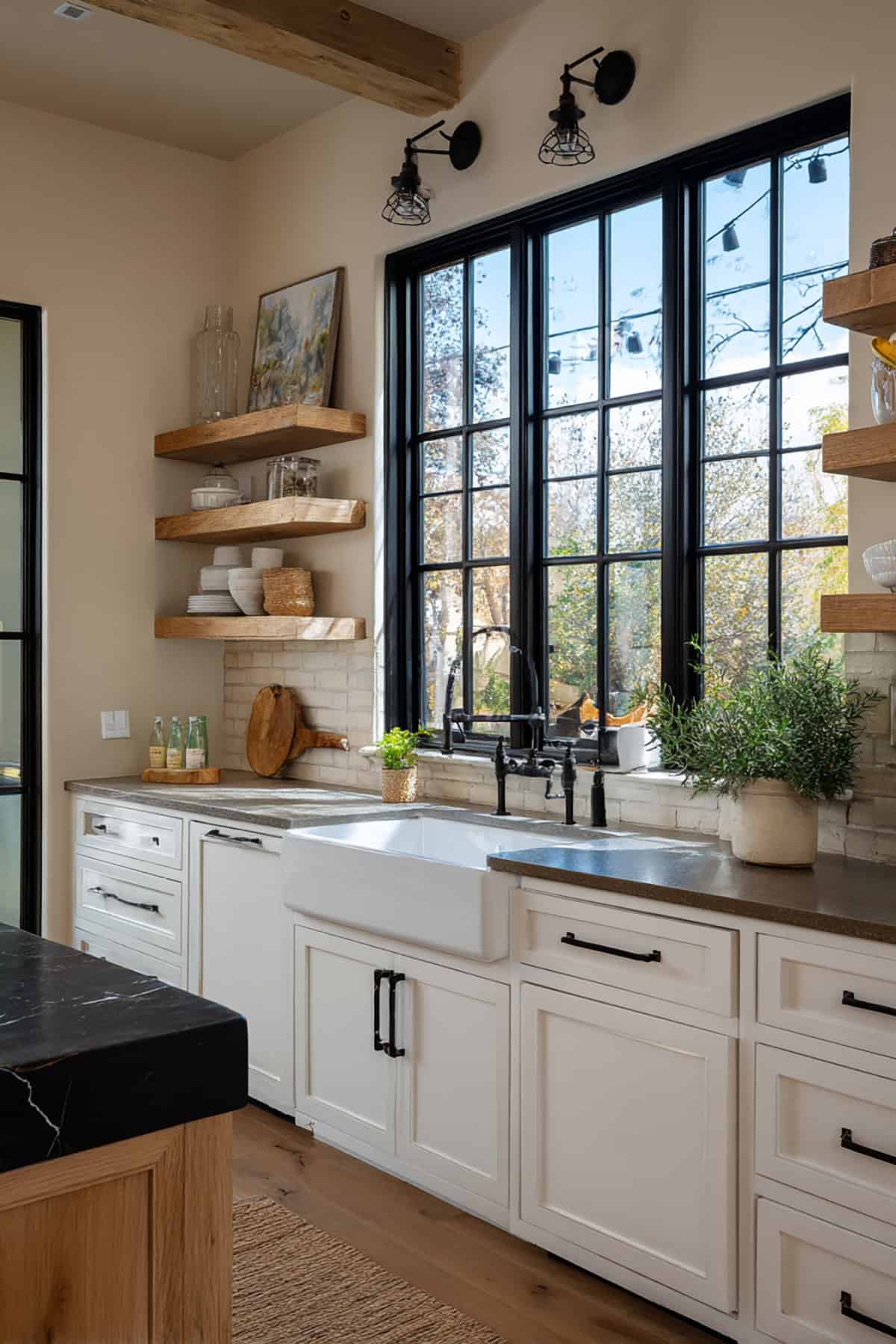 Black Framed Industrial Window Over a Farmhouse Sink