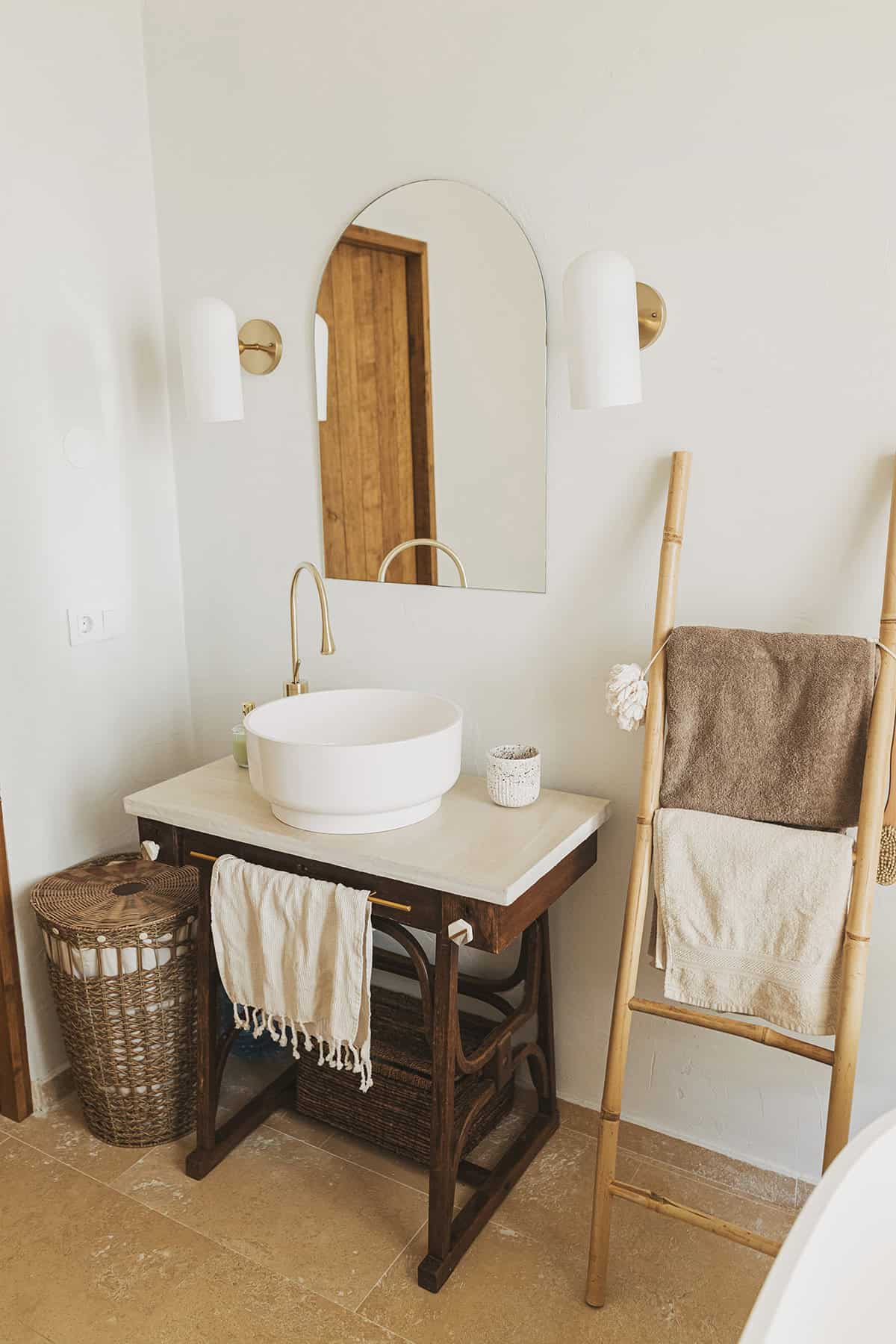 Cozy Nordic Bathroom with Wooden Ladder Towel Rack