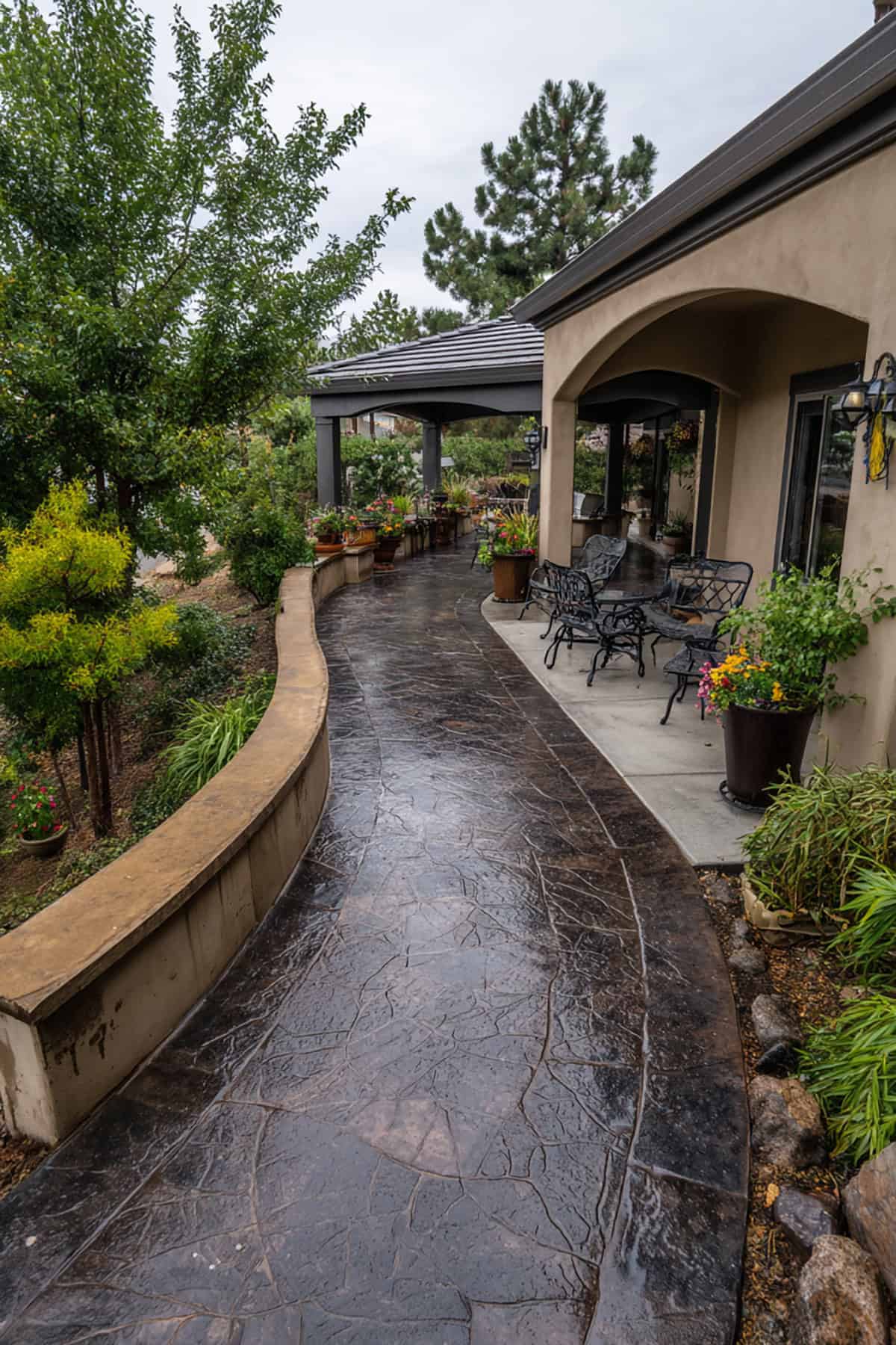 Dark Cobblestone Stamped Concrete Covered Walkway