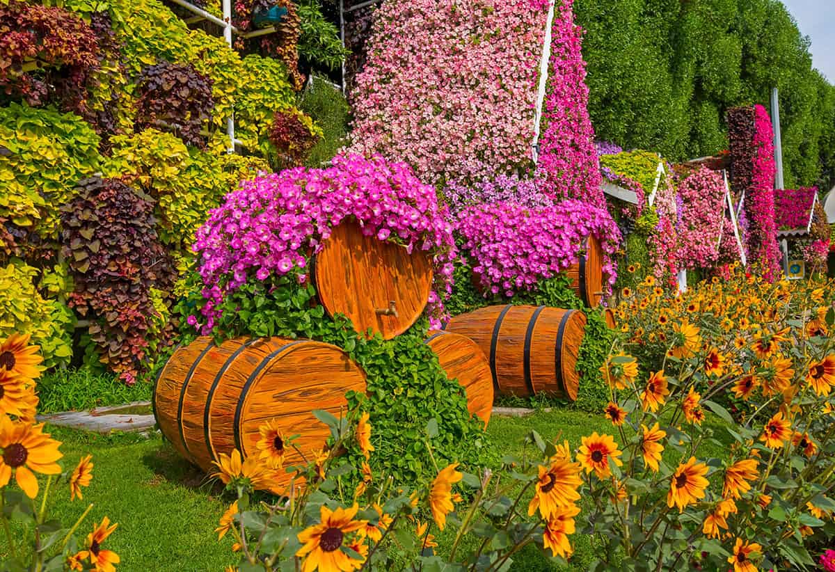 Flower Covered Barrel Fairy Houses