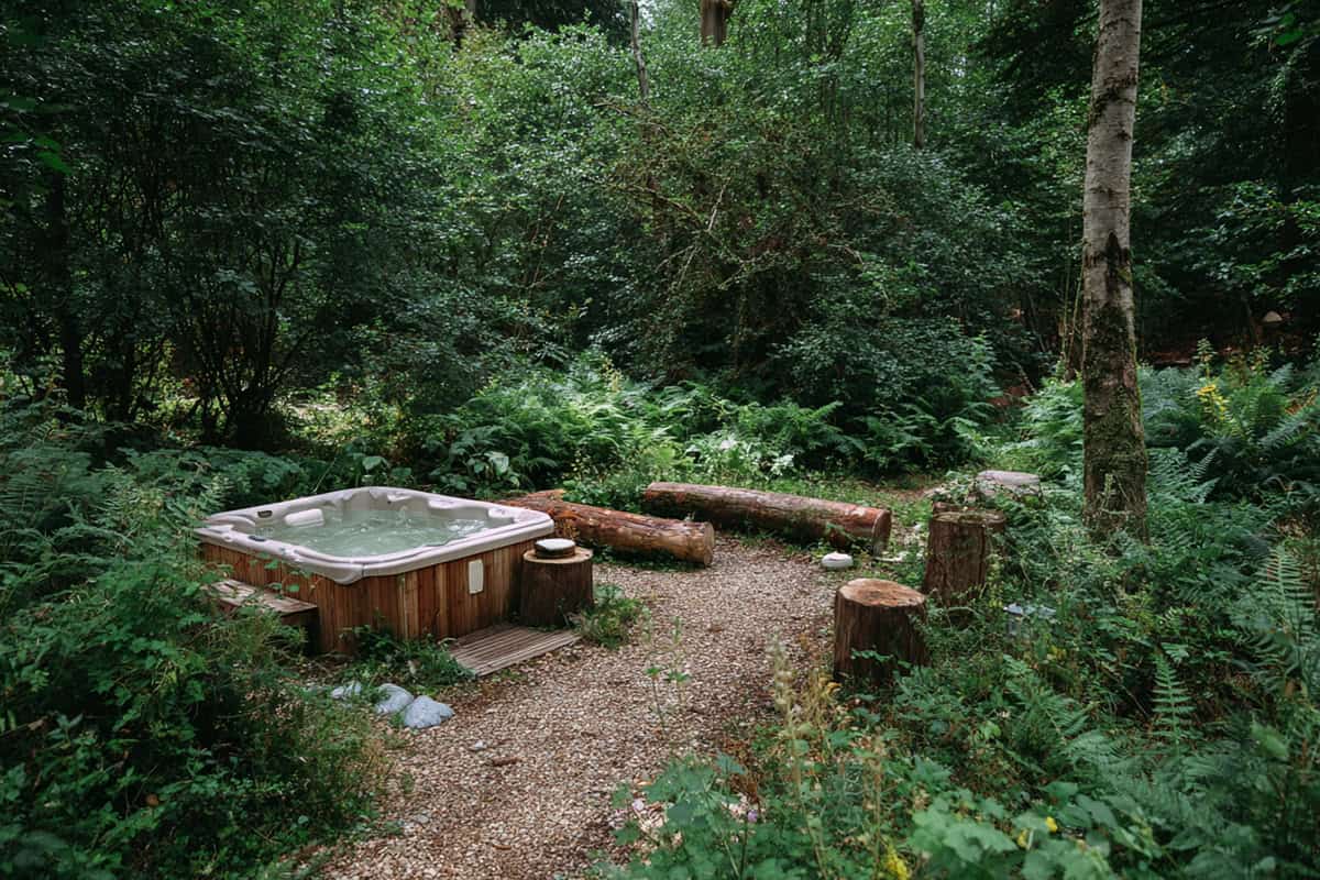 Forest Edge Gravel Clearing Hot Tub