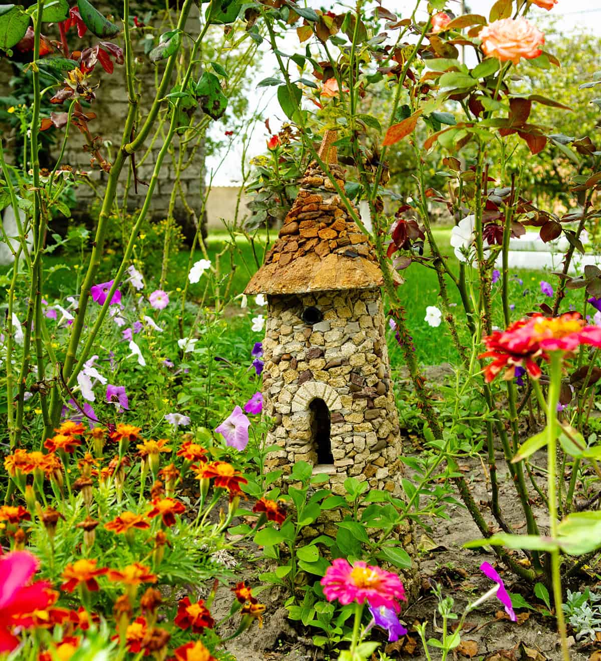 Mini Stone Fairy Cottage in Garden