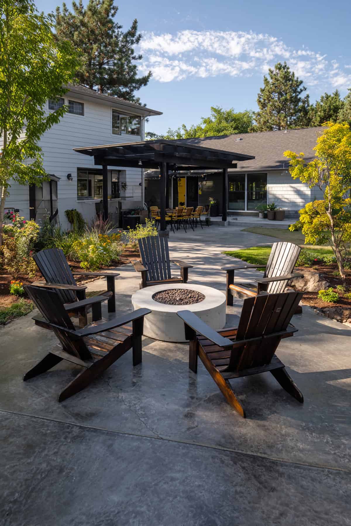 Modern Stamped Concrete Patio with Fire Pit Seating
