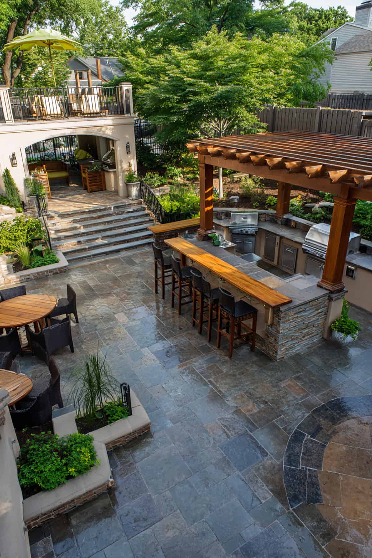 Multi Level Stamped Concrete Patio with Outdoor Kitchen