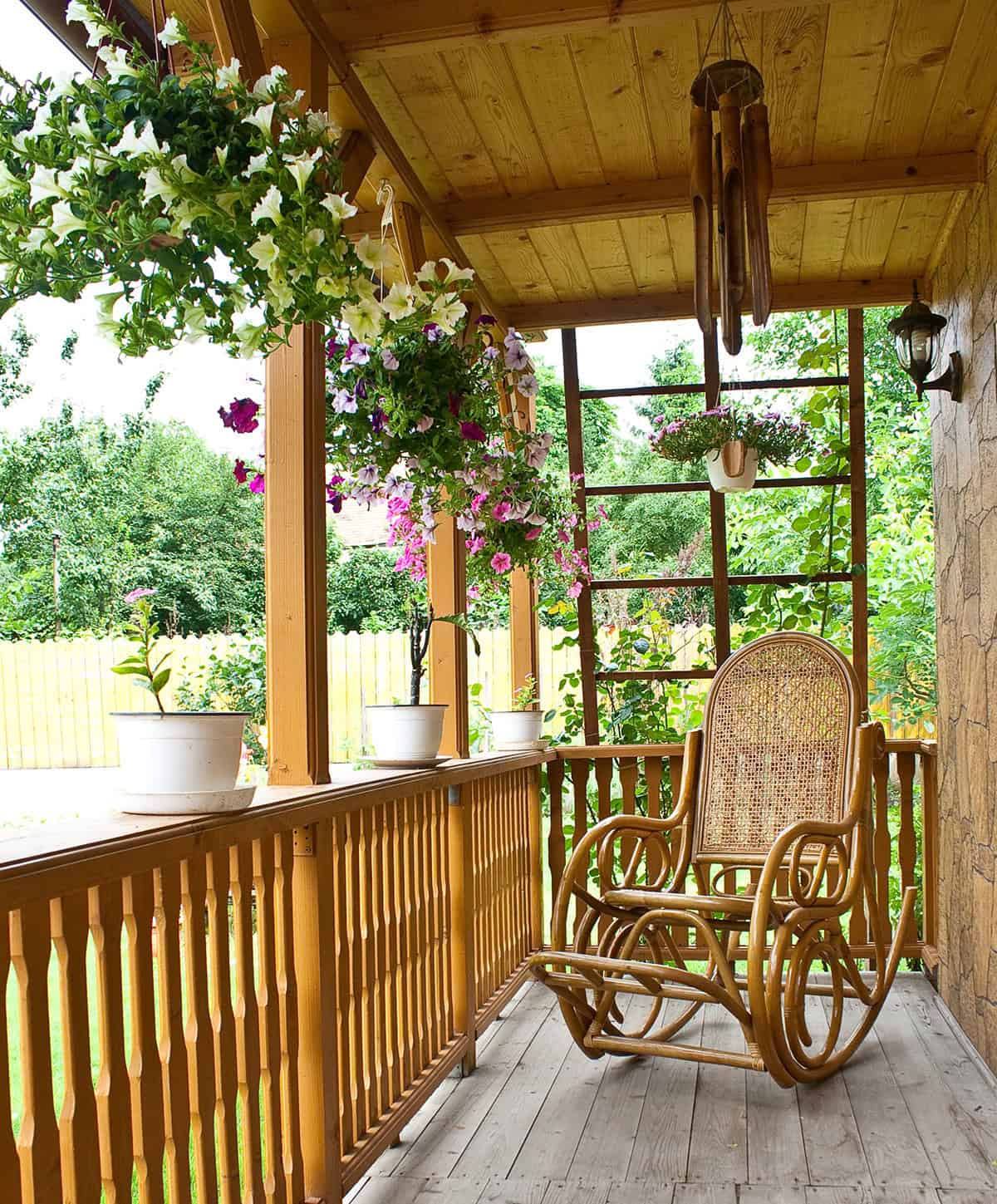 Narrow Back Porch with Rail Planters and Rocking Chair