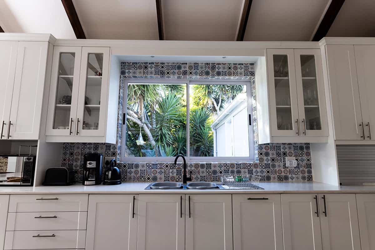 Patterned Tile Highlighting Framing Around the Window
