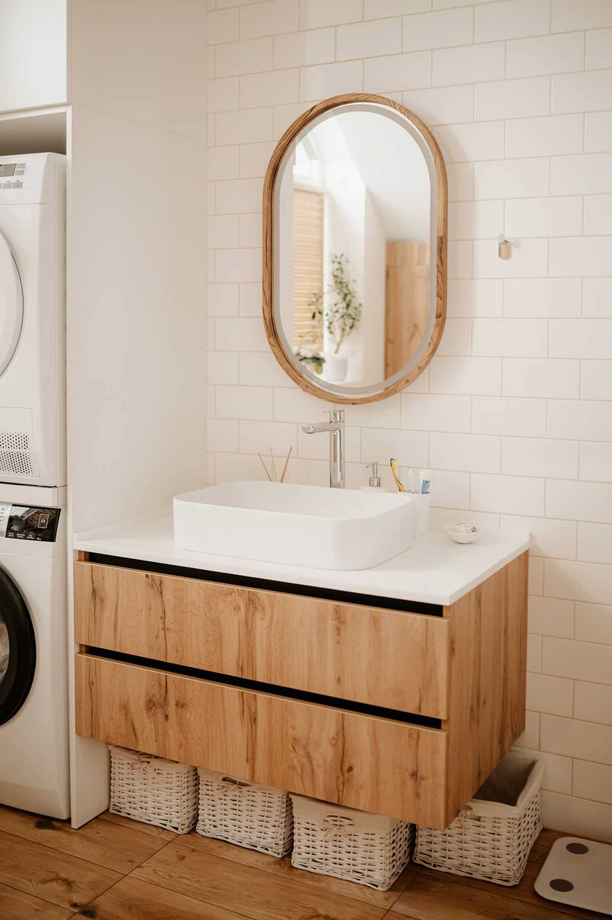 White Tile Bathroom with Natural Storage Baskets