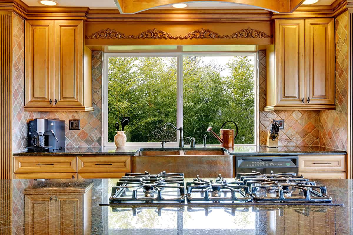 Wood Cabinets Around an Expansive Window
