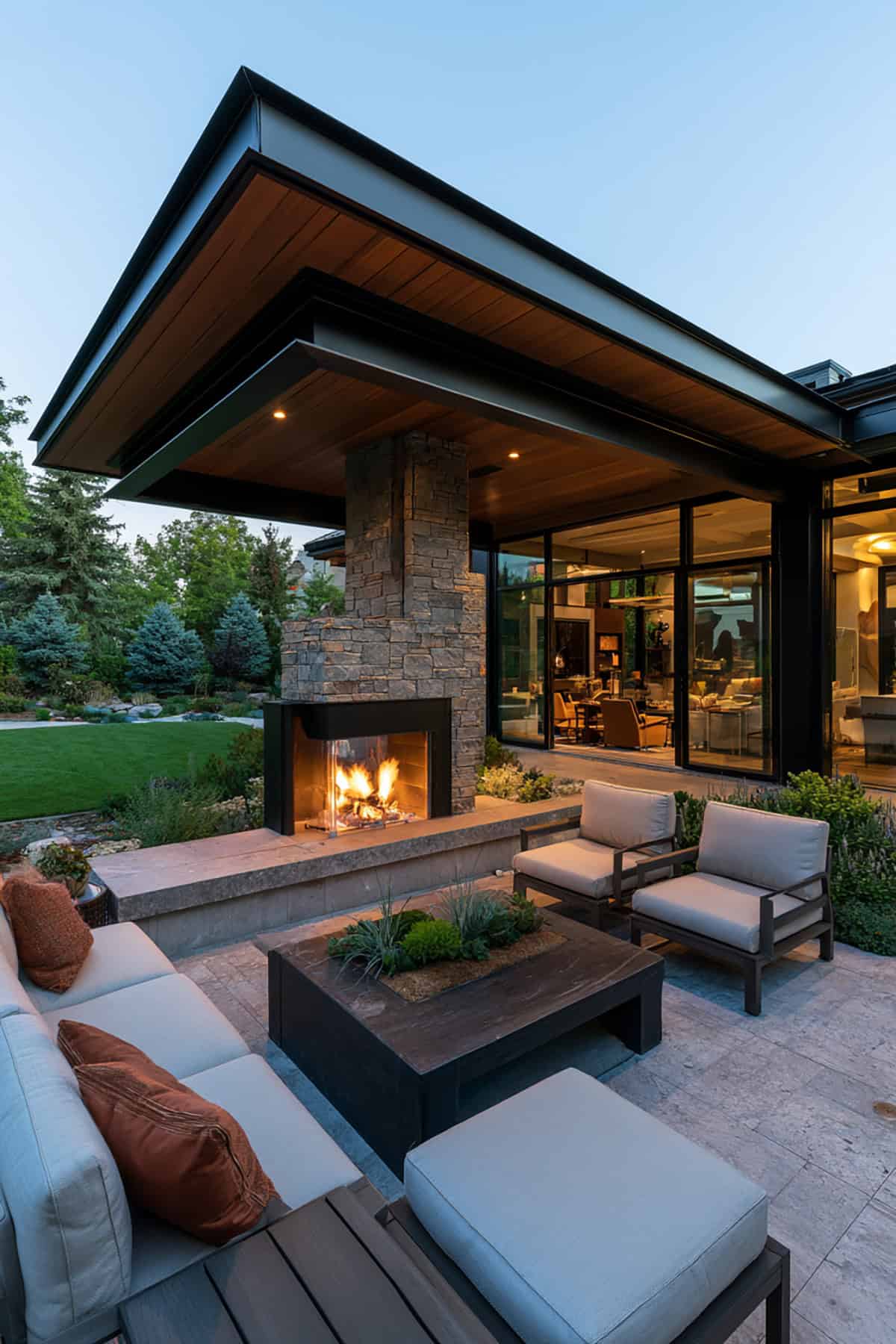 Black Frame Covered Patio With Outdoor Fireplace