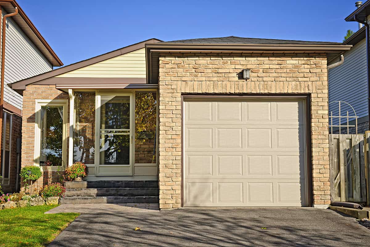 Brick Bungalow Exterior With Functional Front Garage