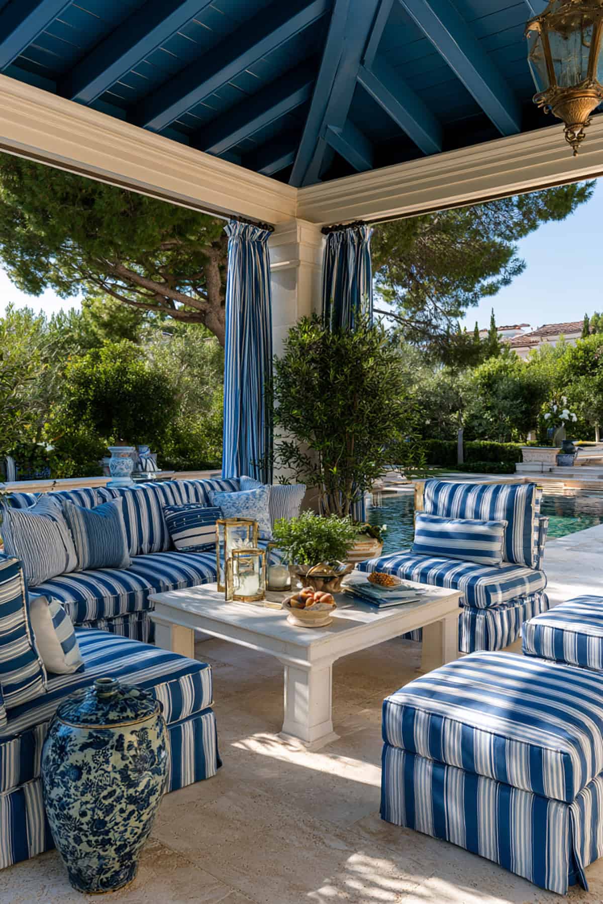 Covered Patio With Coastal Blue And White Seating