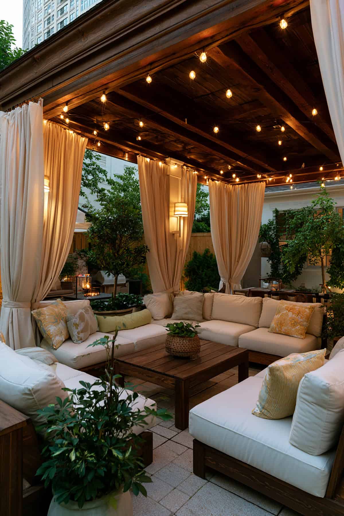 Covered Patio With Curtain Panels And Soft Lighting