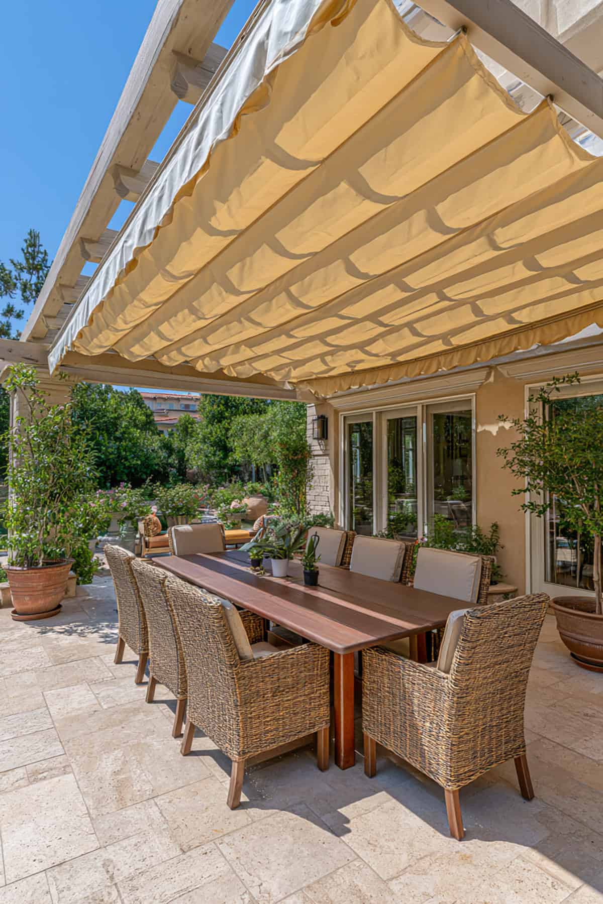 Covered Patio With Retractable Canopy And Dining Zone