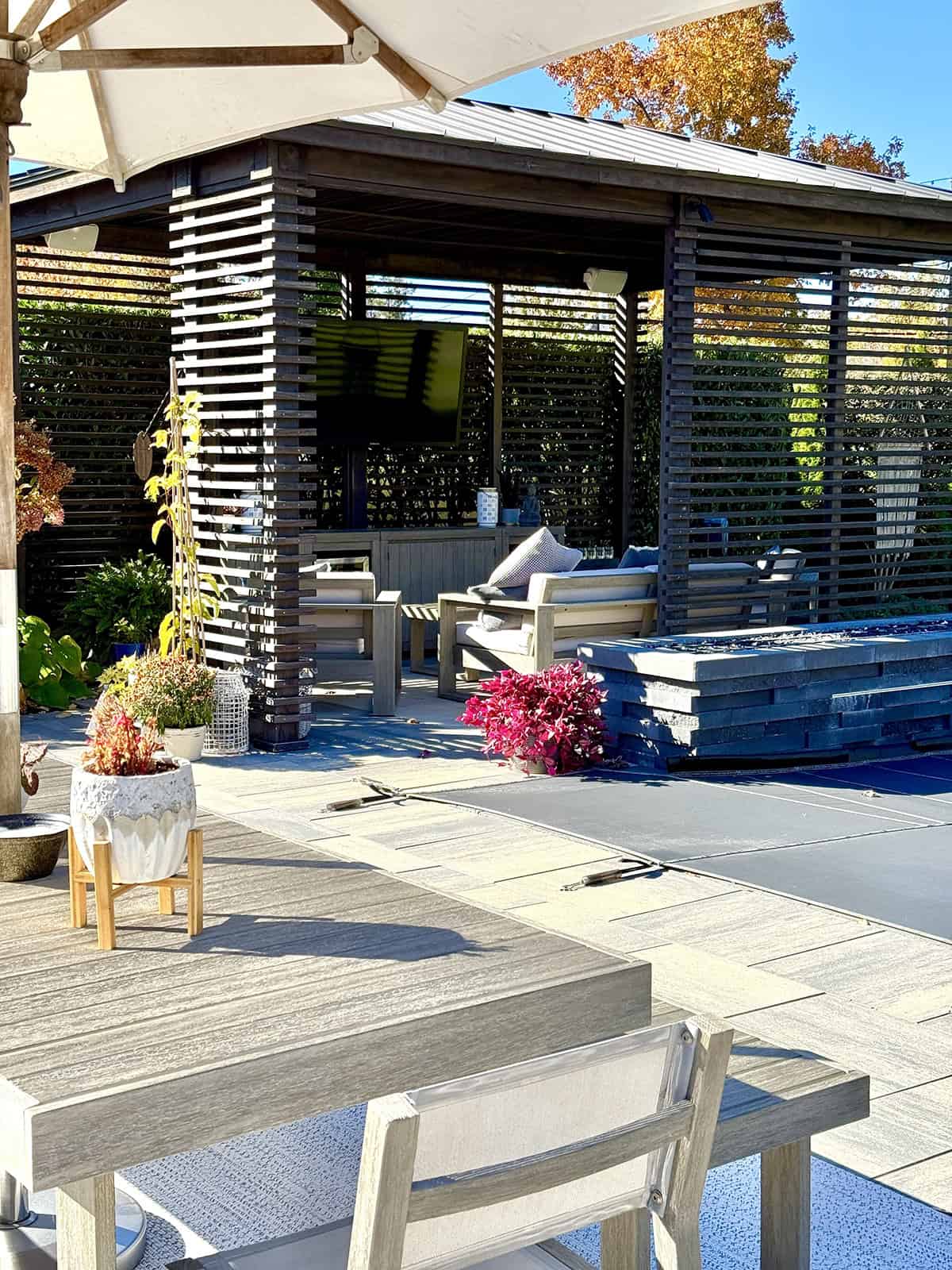 Slatted Wood Covered Patio With Privacy Screens