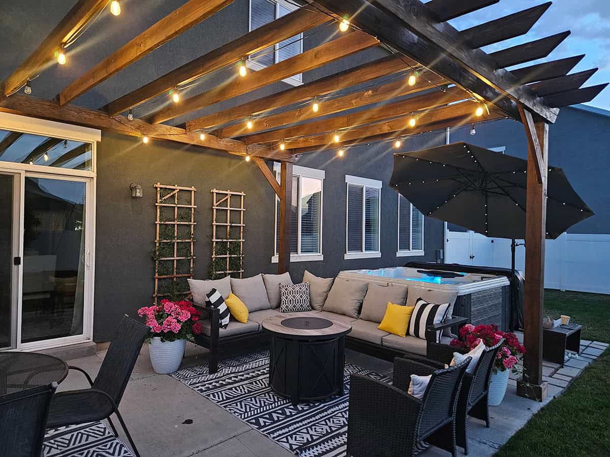 Wood Pergola Covered Patio With Pergola, Hot Tub, And Fire Pit