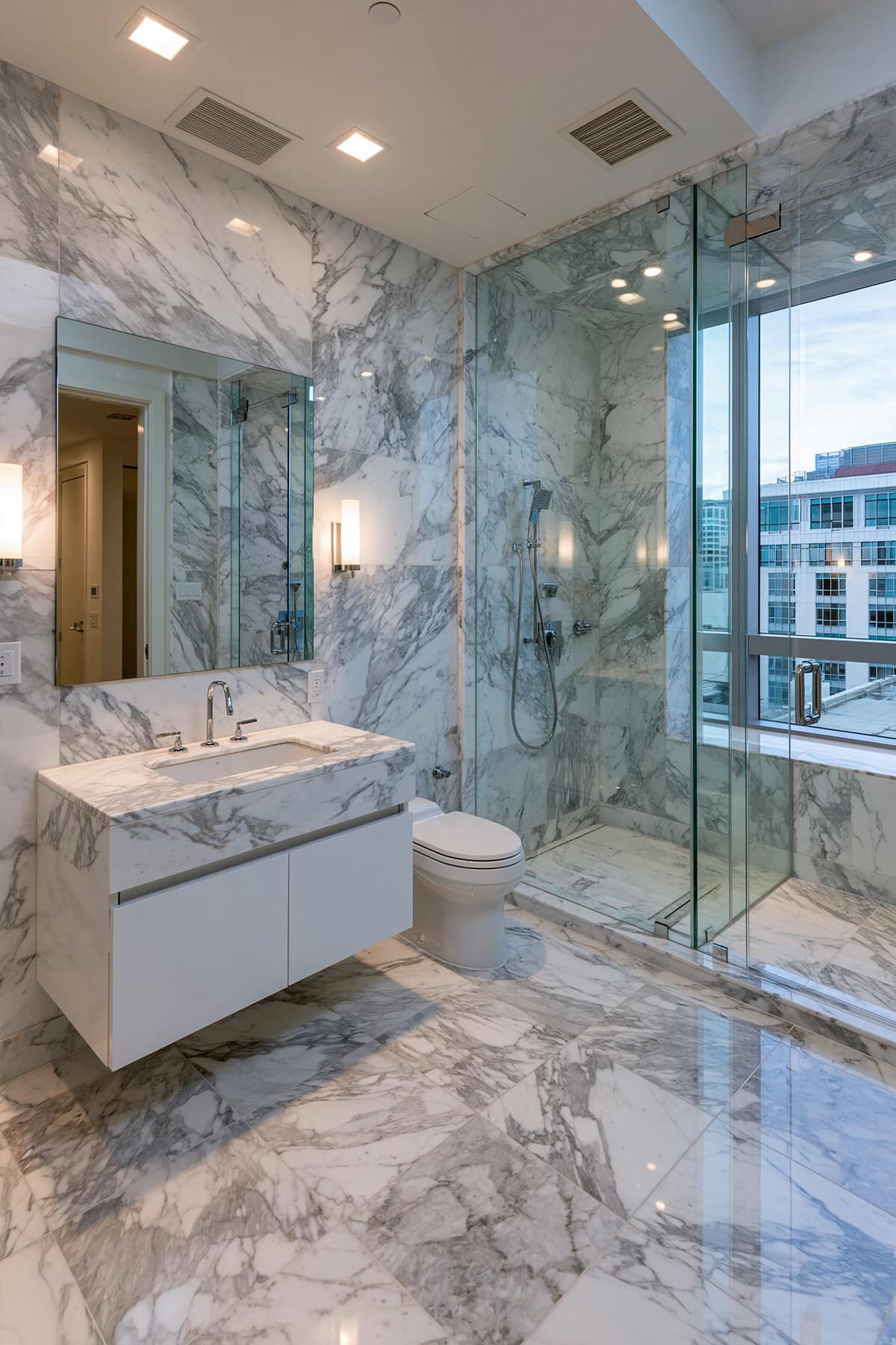 White Bathroom With Floor To Ceiling Marble