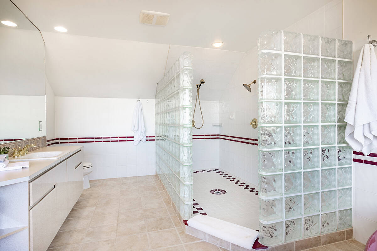 White Bathroom With Glass Block Wall