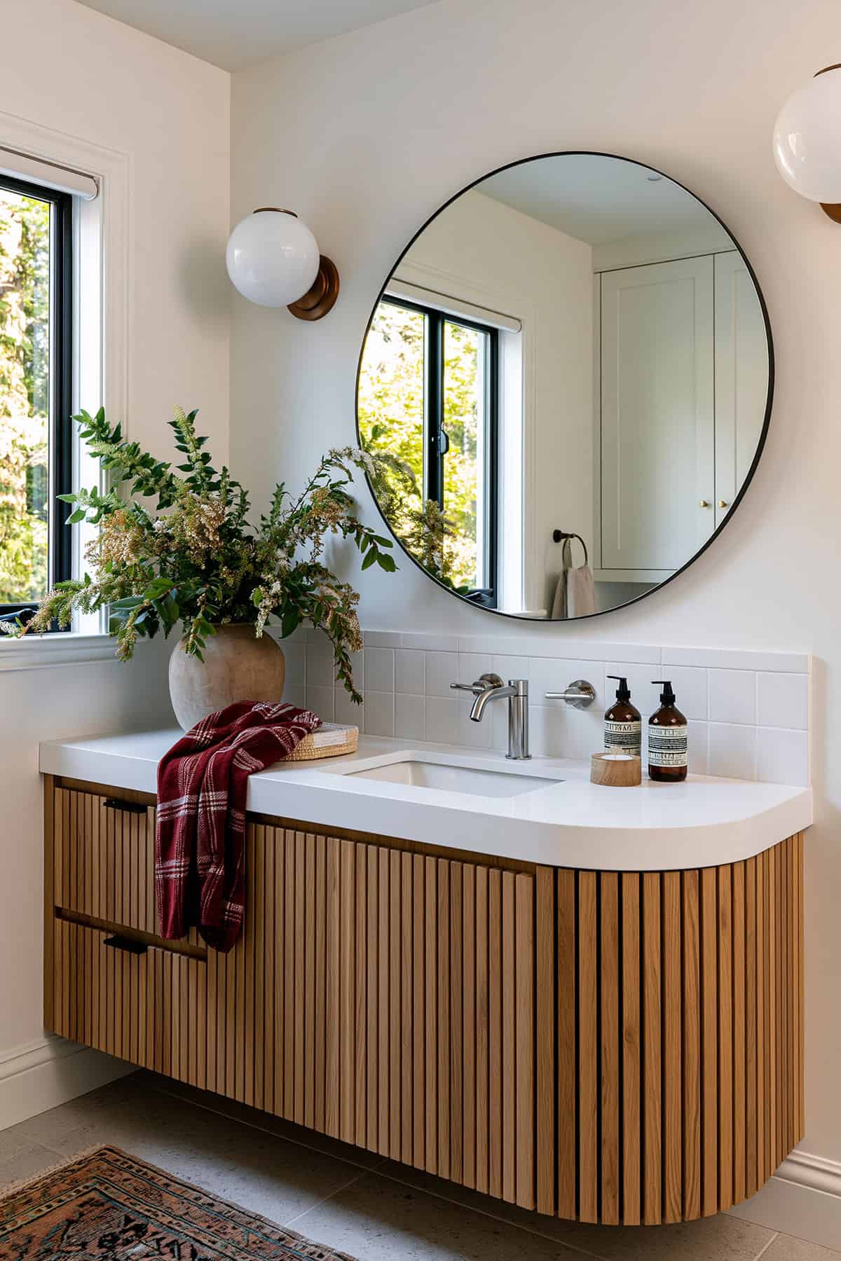 White Bathroom With Wood Slat Vanit