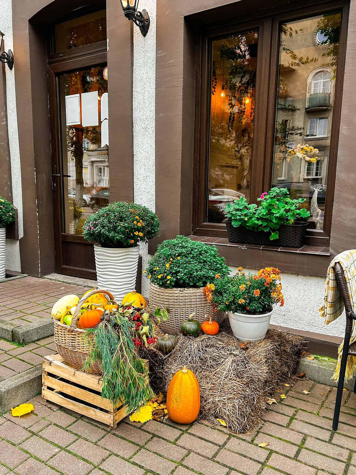 Arrange Pumpkins Around Hay Bales