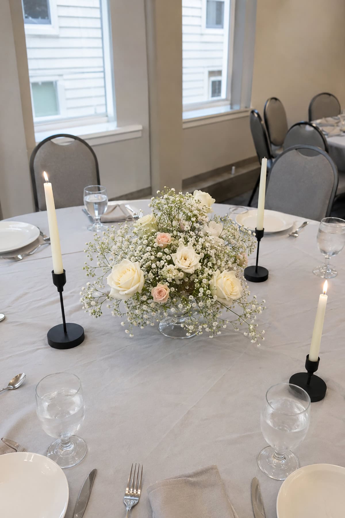 Baby’s Breath With Black Tapers
