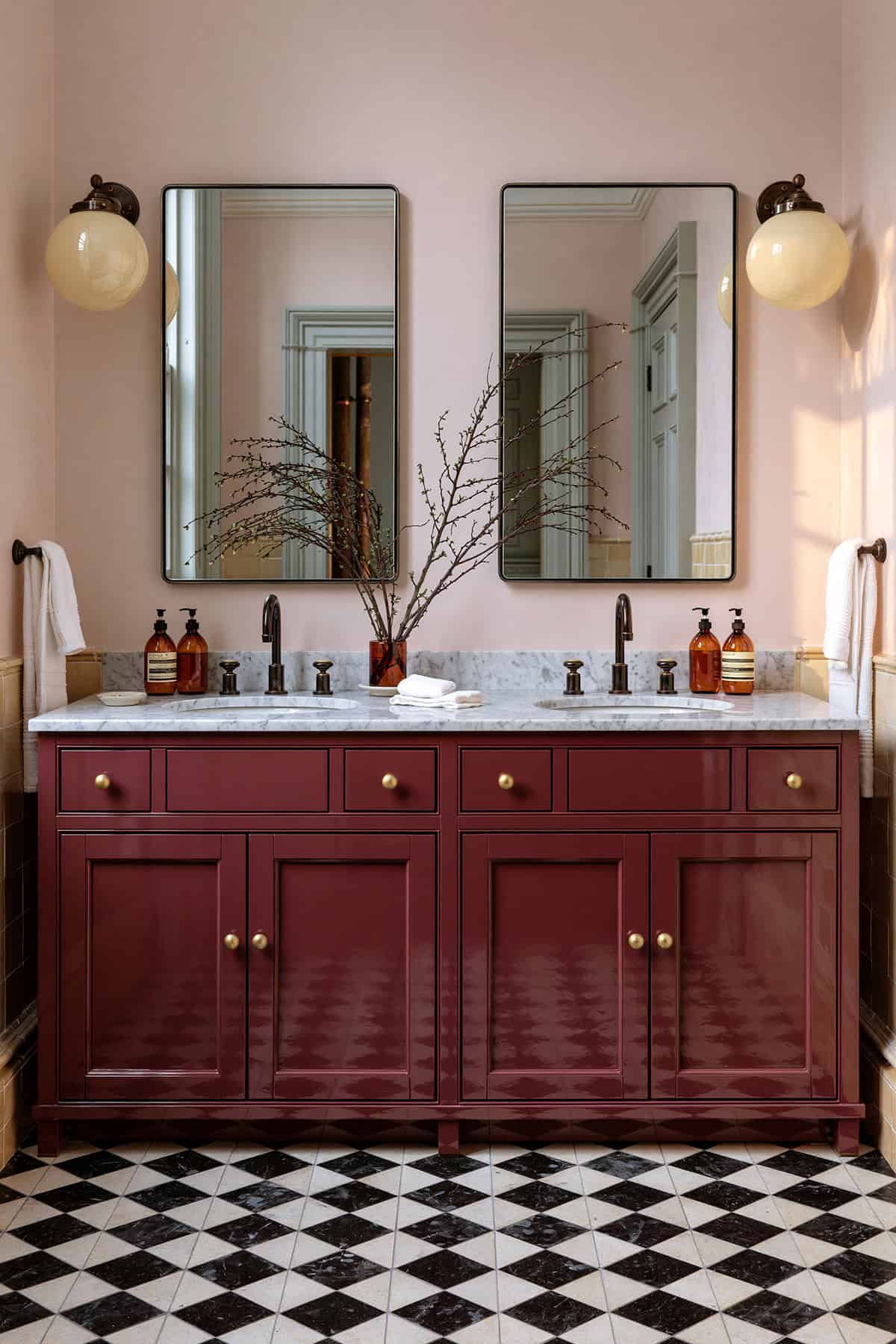 Burgundy Double Vanity With Checkerboard Floors