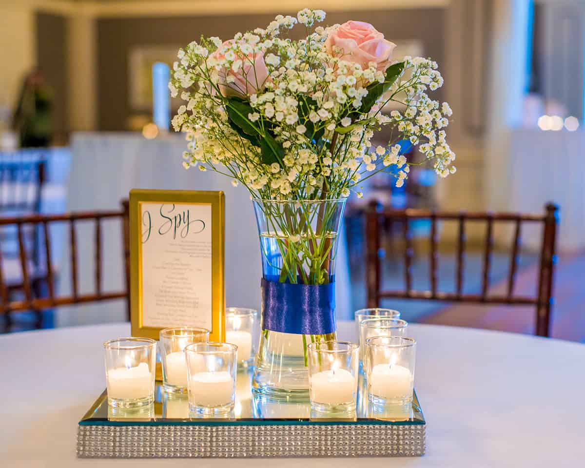 Candlelit Rose And Baby’s Breath Centerpiece