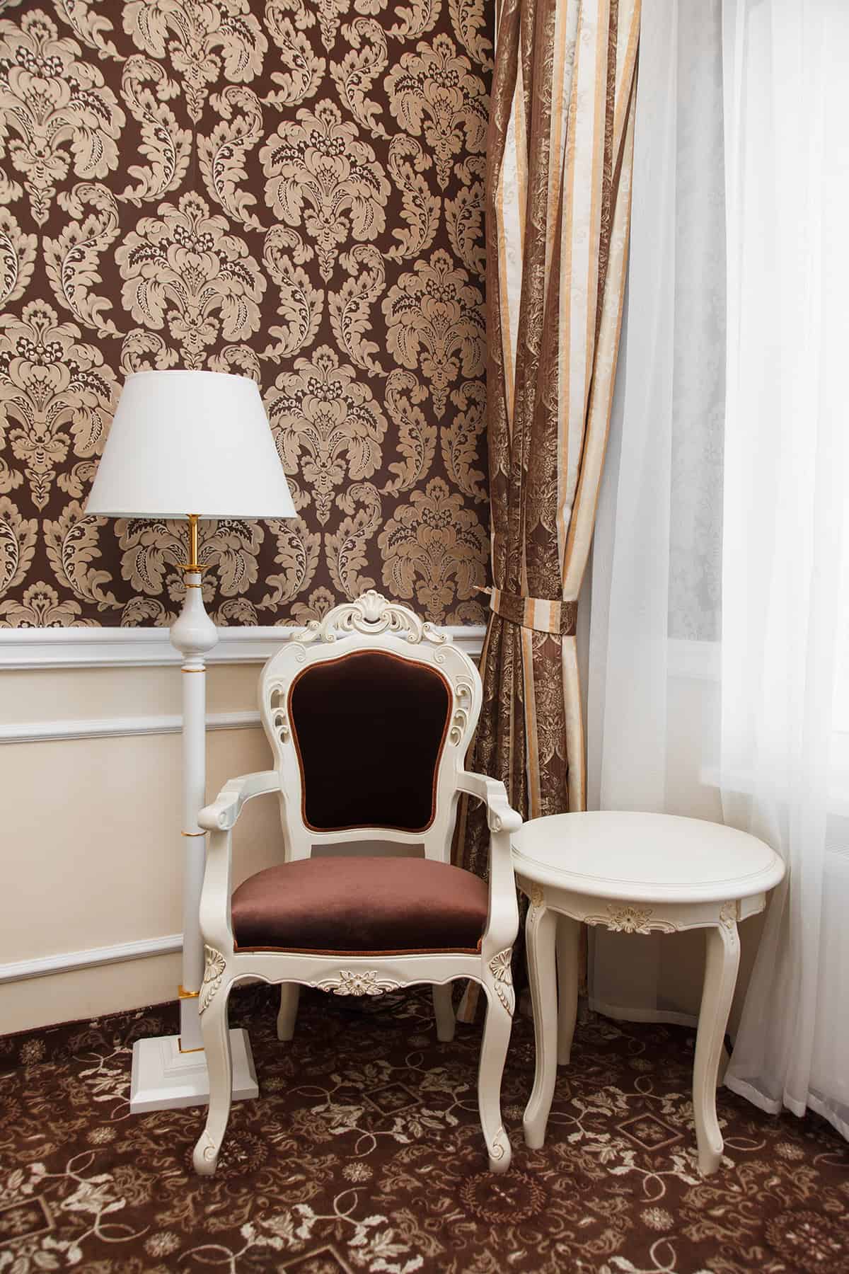 Classic Bedroom Reading Corner With Damask