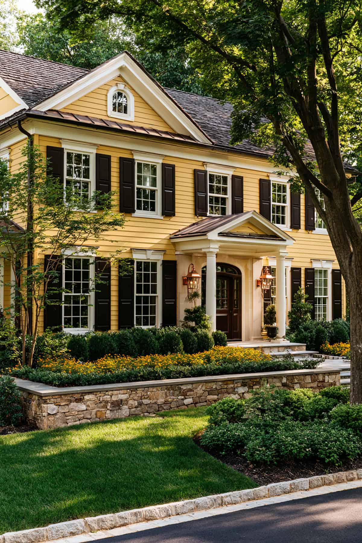 Dark Bronze Shutters On A Yellow Exterior
