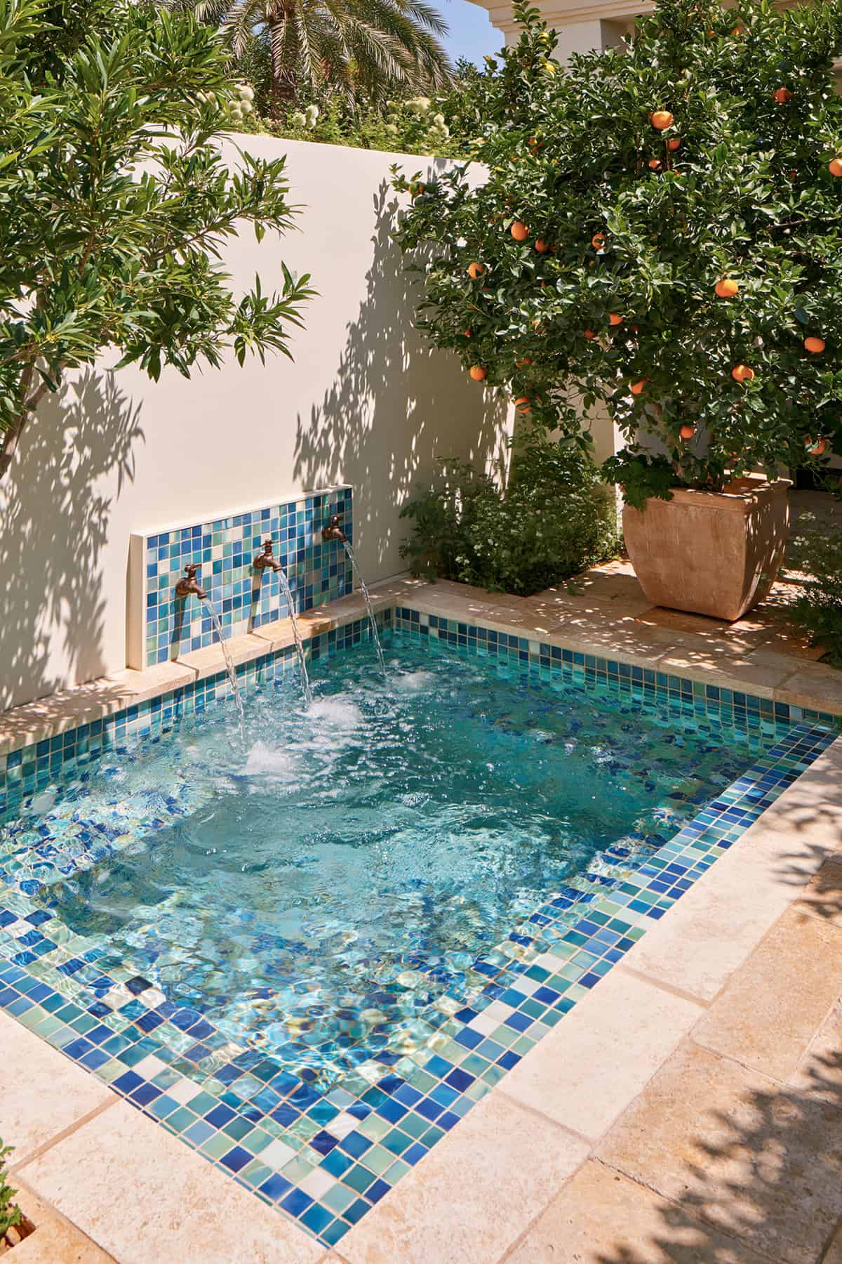 Fountain Fed Mini Pool With Blue Mosaic Tile