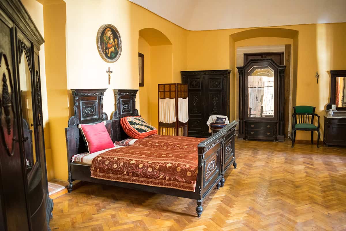 Medieval Bedroom With Carved Wood Furniture