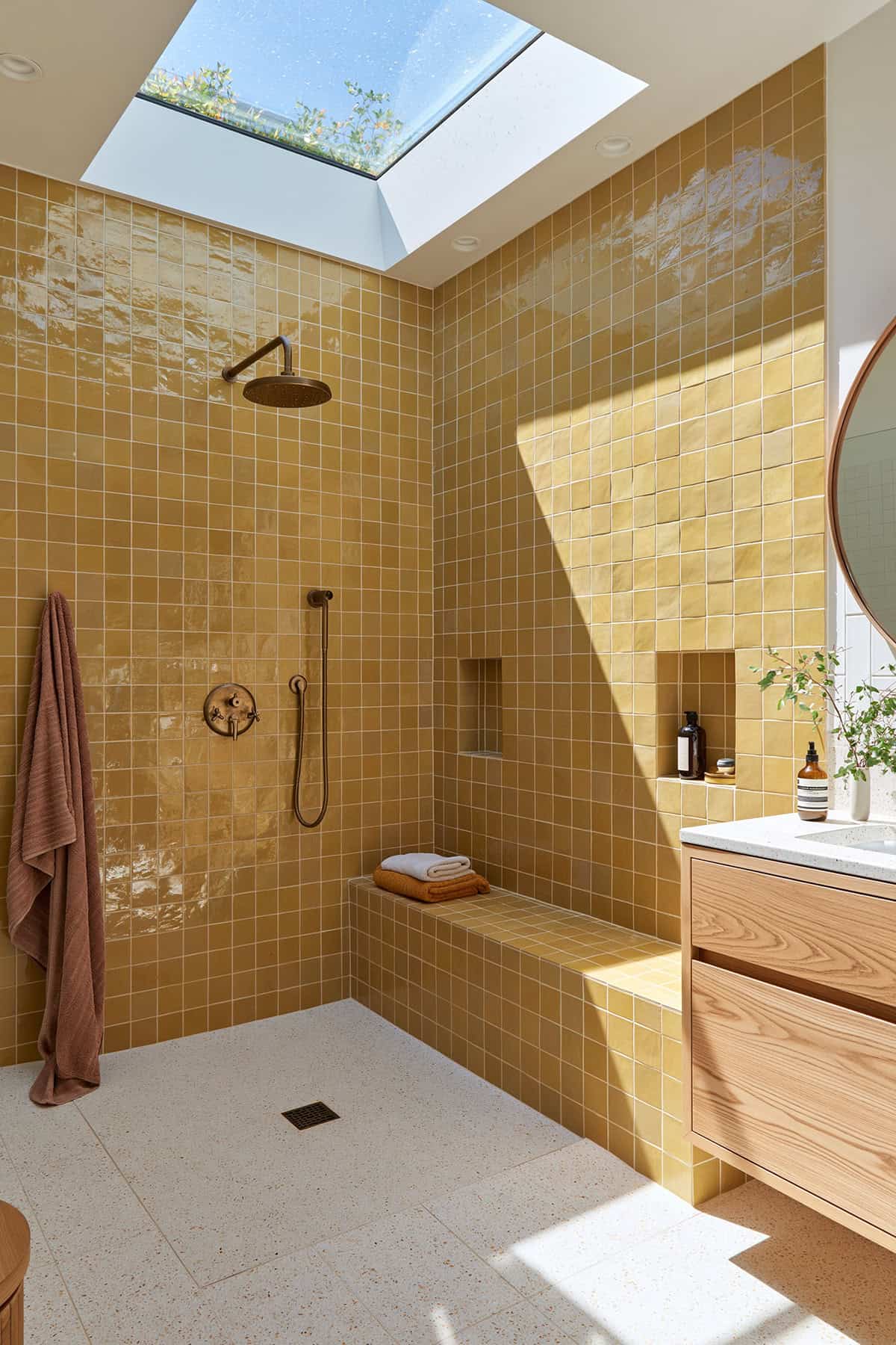 Ochre Tile Bathroom With A Skylit Shower