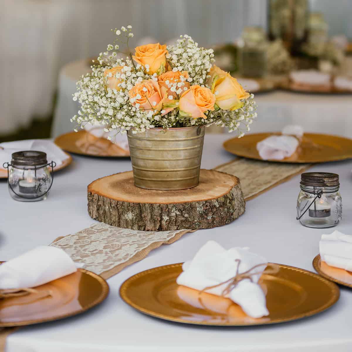Peach Roses And Baby’s Breath Centerpiece