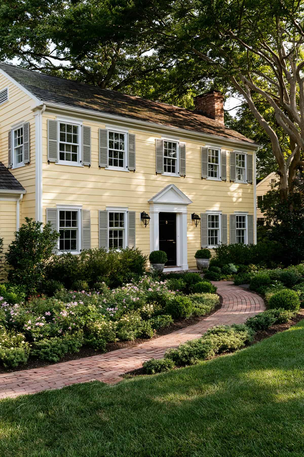 Pewter Gray Shutters On A Yellow Colonial