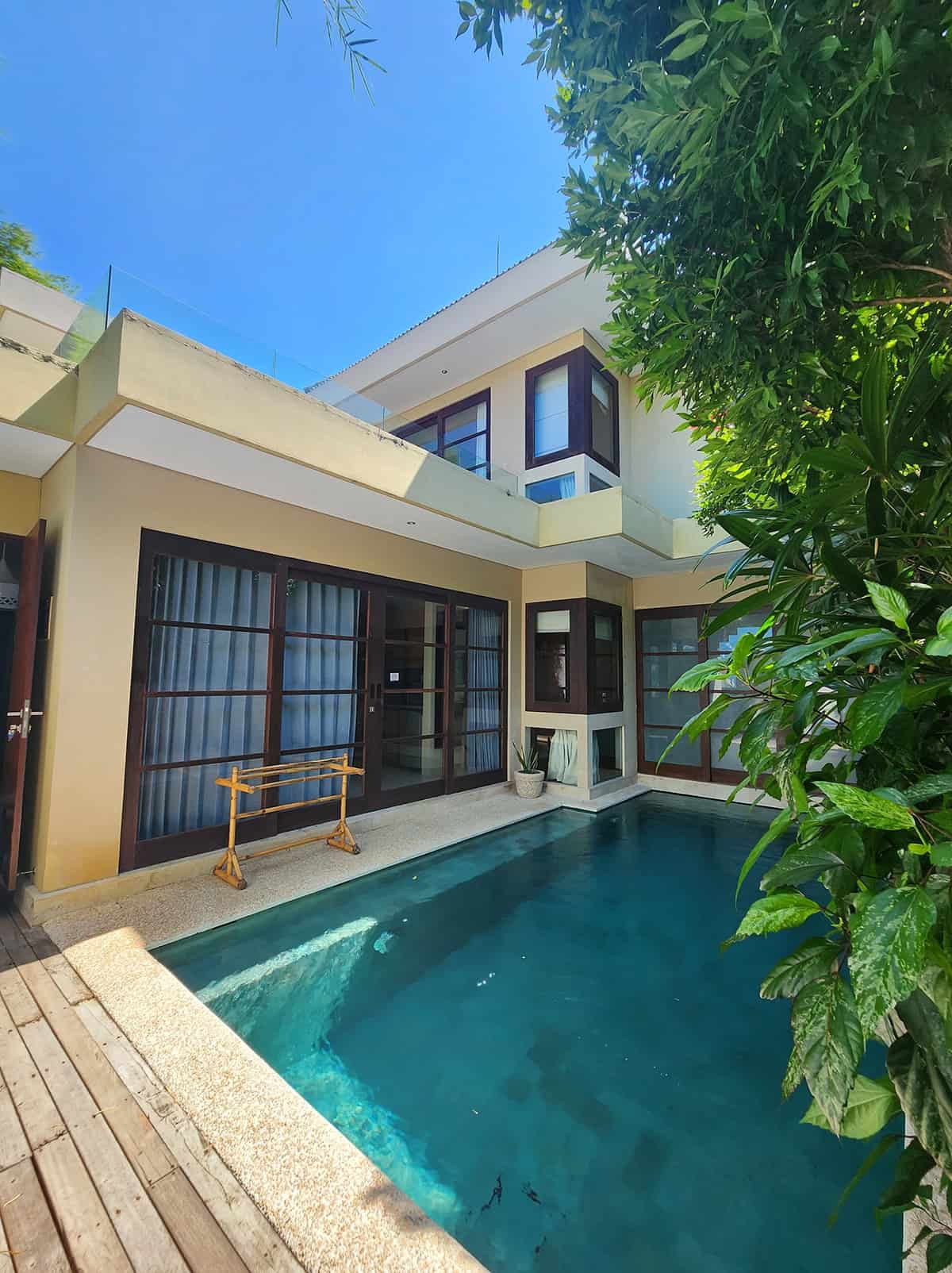 Private Courtyard Pool Framed By Tropical Greenery