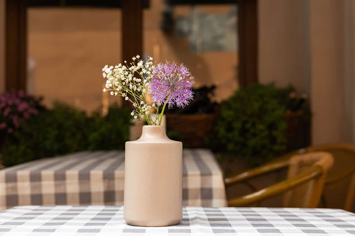 Purple Allium And Baby’s Breath Centerpiece