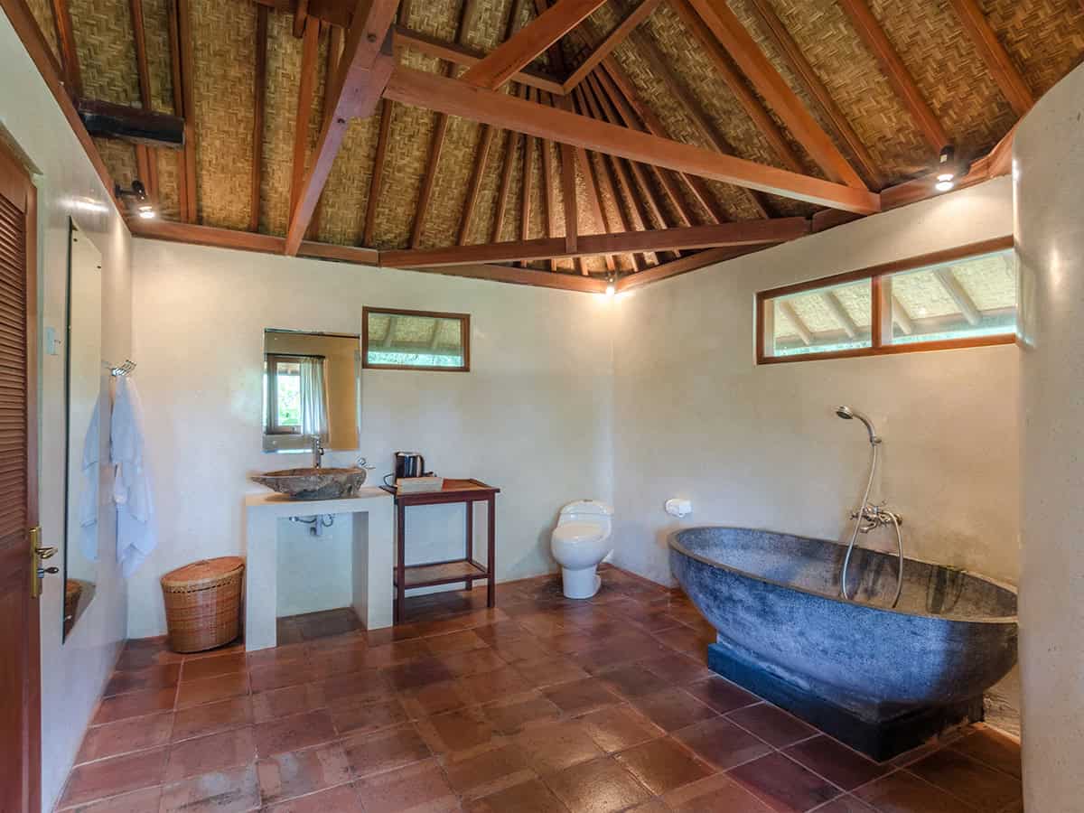 Stone Bathtub And Terracotta Floors