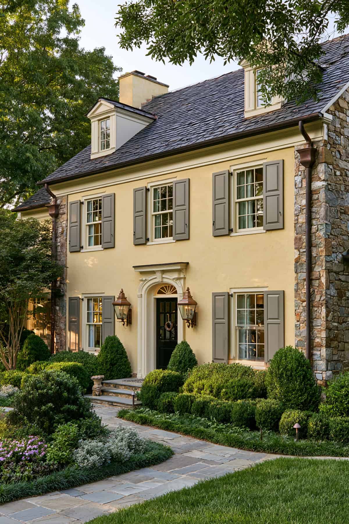 Warm Gray Shutters On A Yellow House