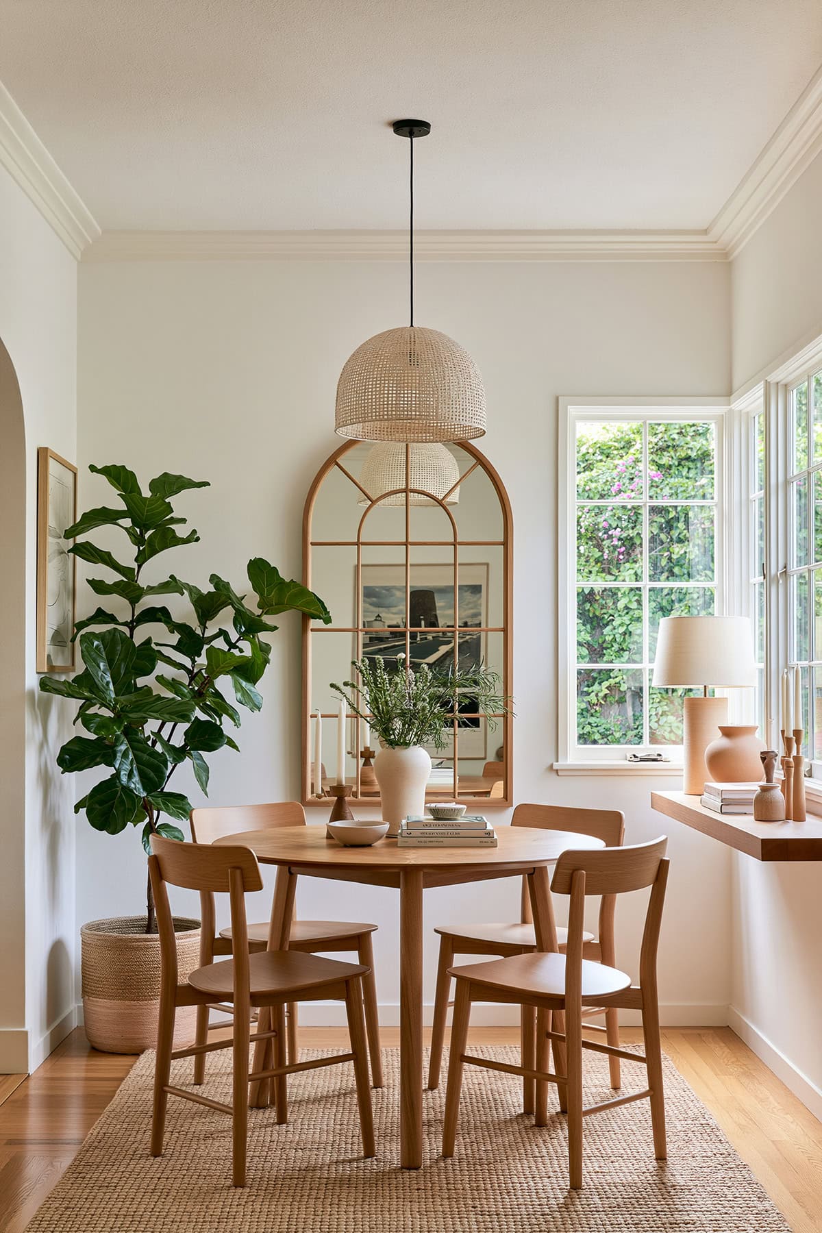 Arched Windowpane Mirror in a Small Dining Room
