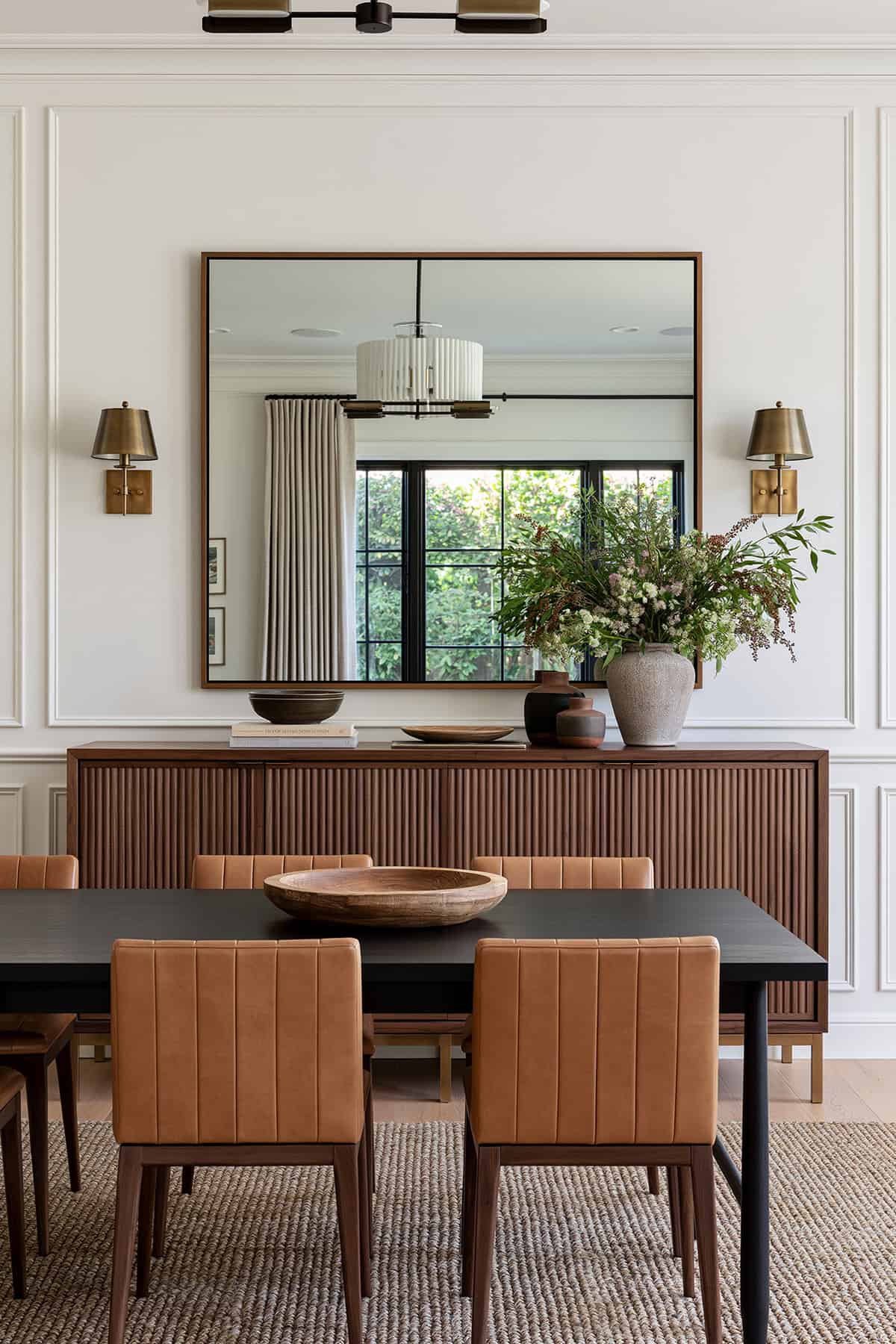Mirror Flanked by Matching Wall Sconces