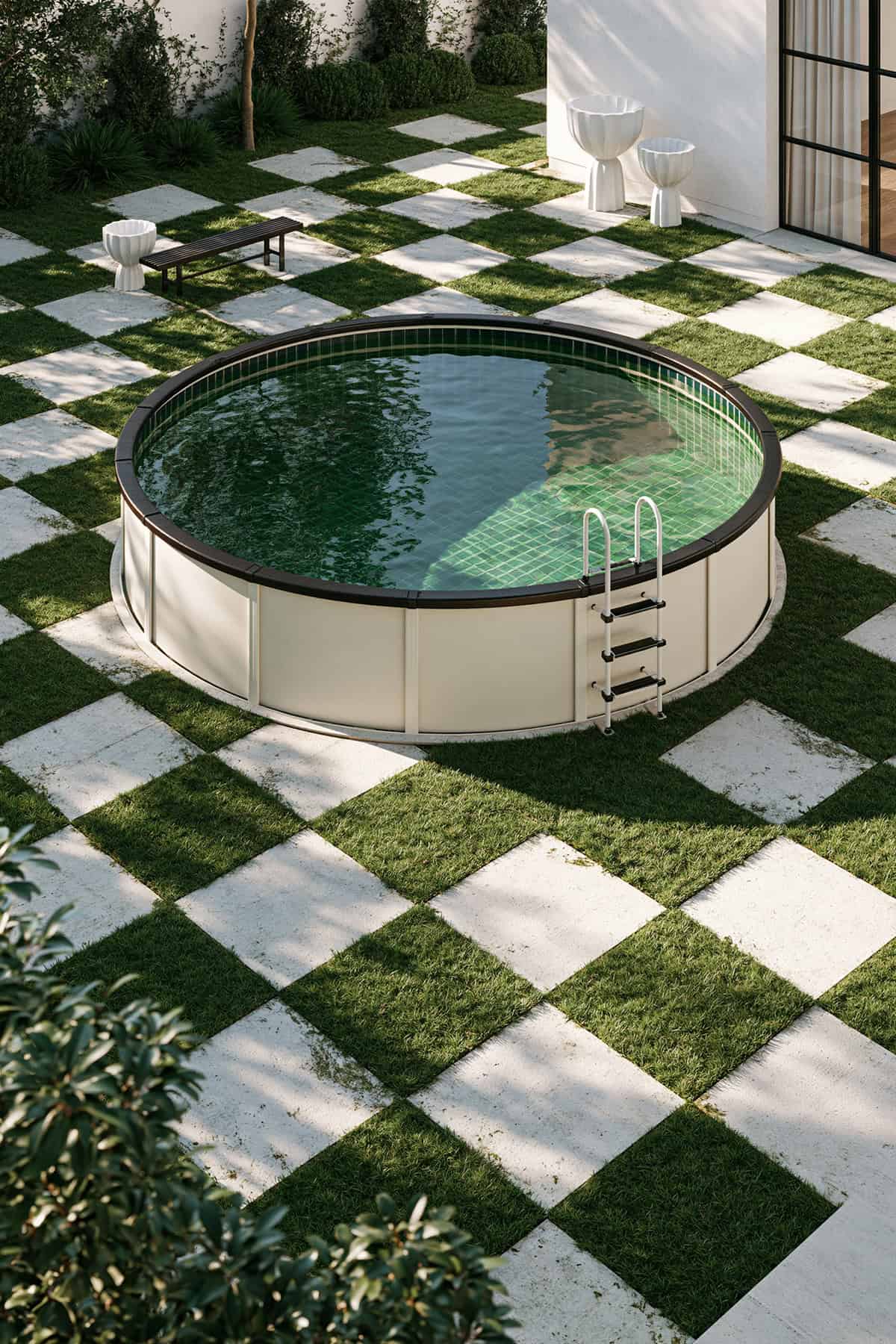 Pool Surrounded By Grass And Paver Checkerboard Flooring