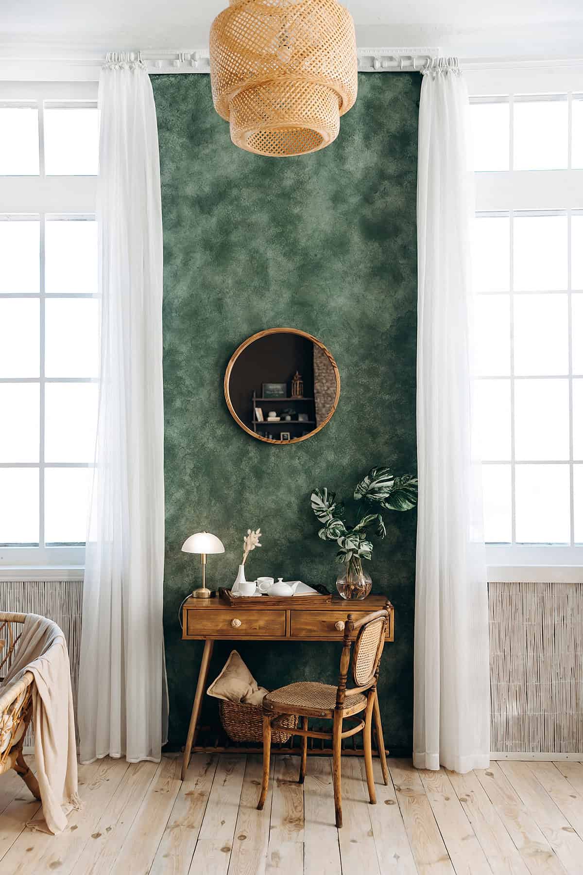 Rich Green Walls With Natural Wood Decor