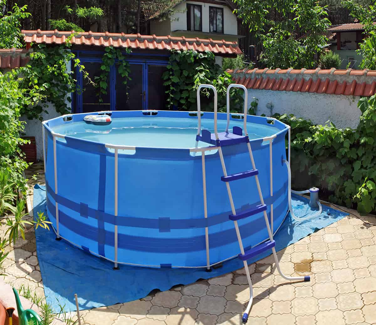 Round Frame Pool With A Simple Patio Base