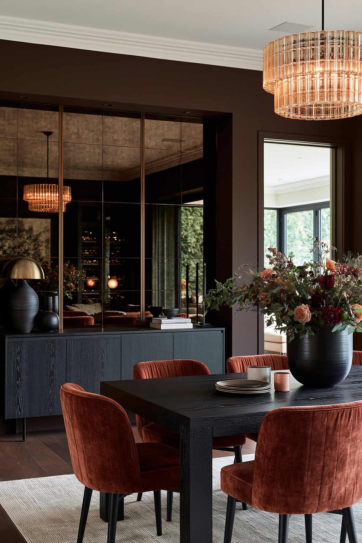 Smoked Mirror Panels for a Moody Dining Room
