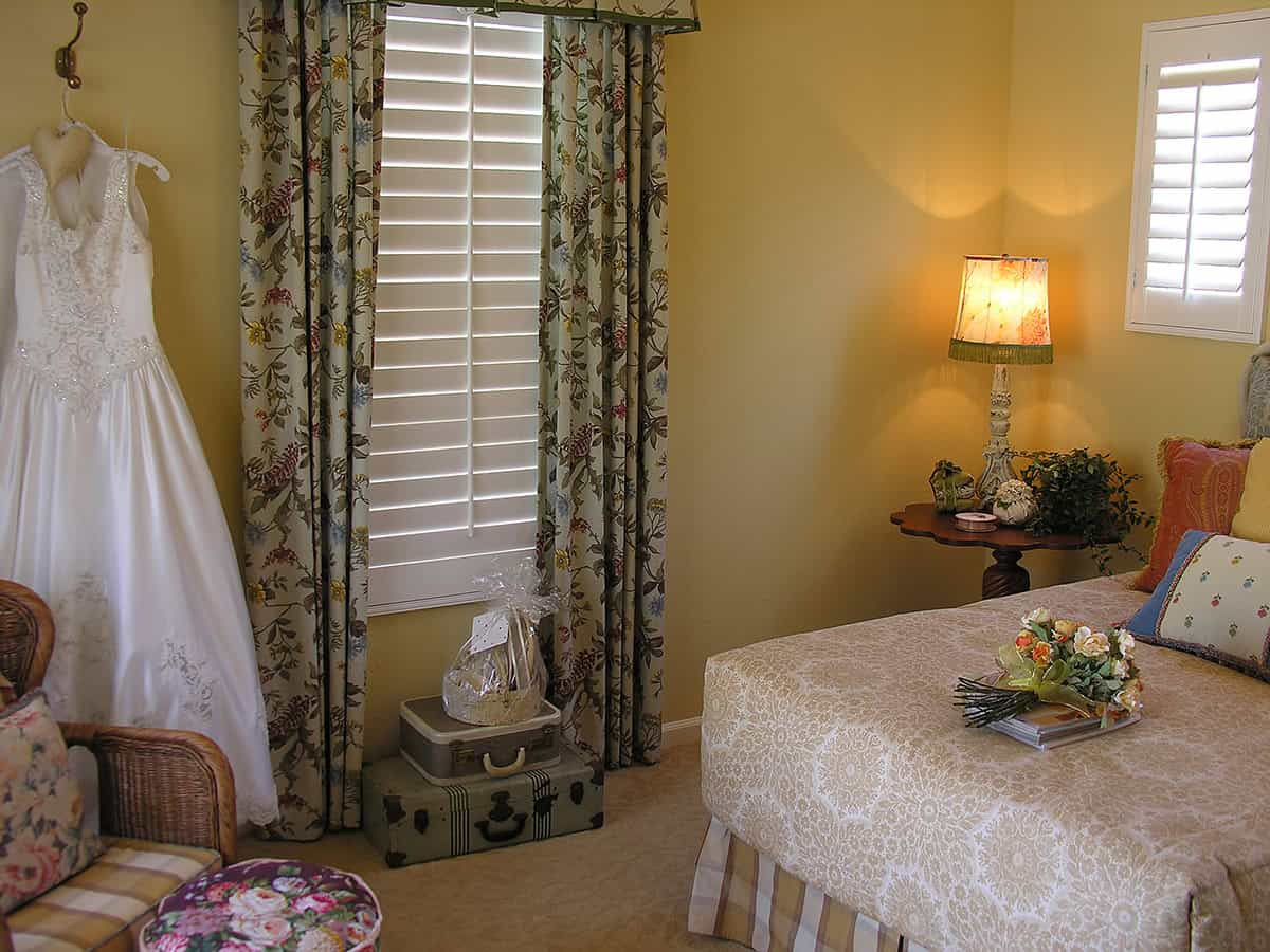 Warm Yellow Bedroom With Florals