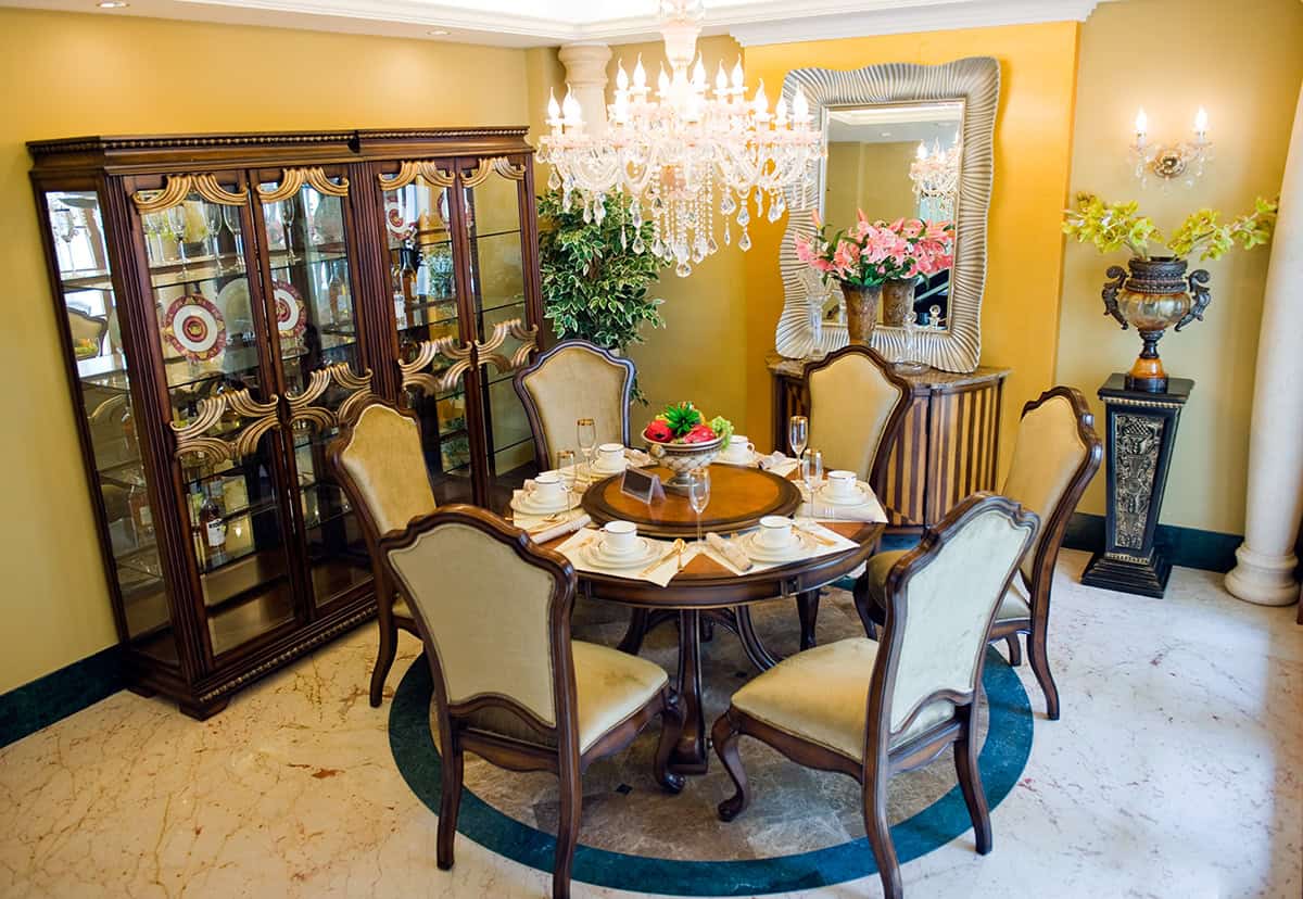 Wavy Framed Mirror Above a Corner Console