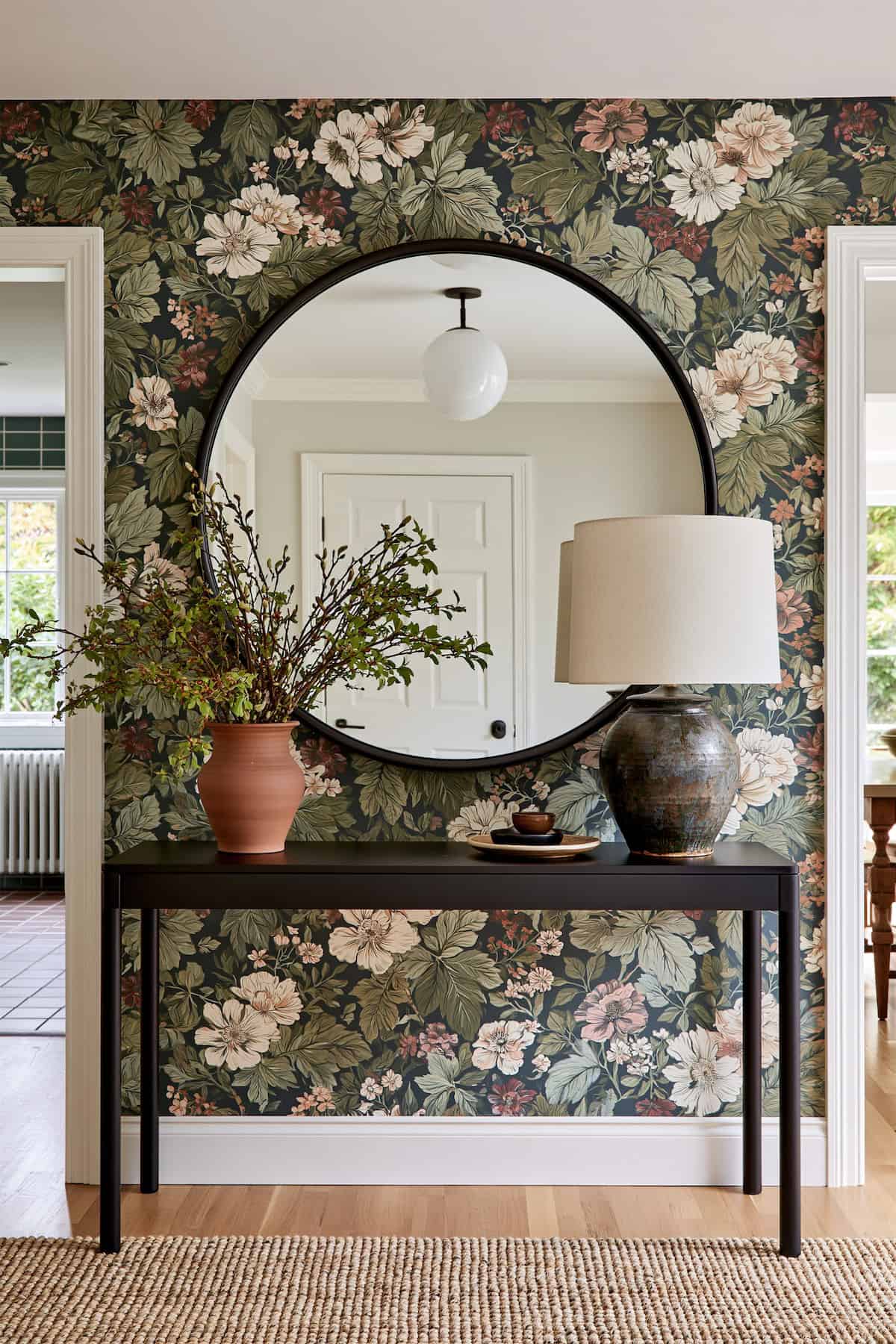 Where Floral Wallpaper Meets a Black Entryway Mirror
