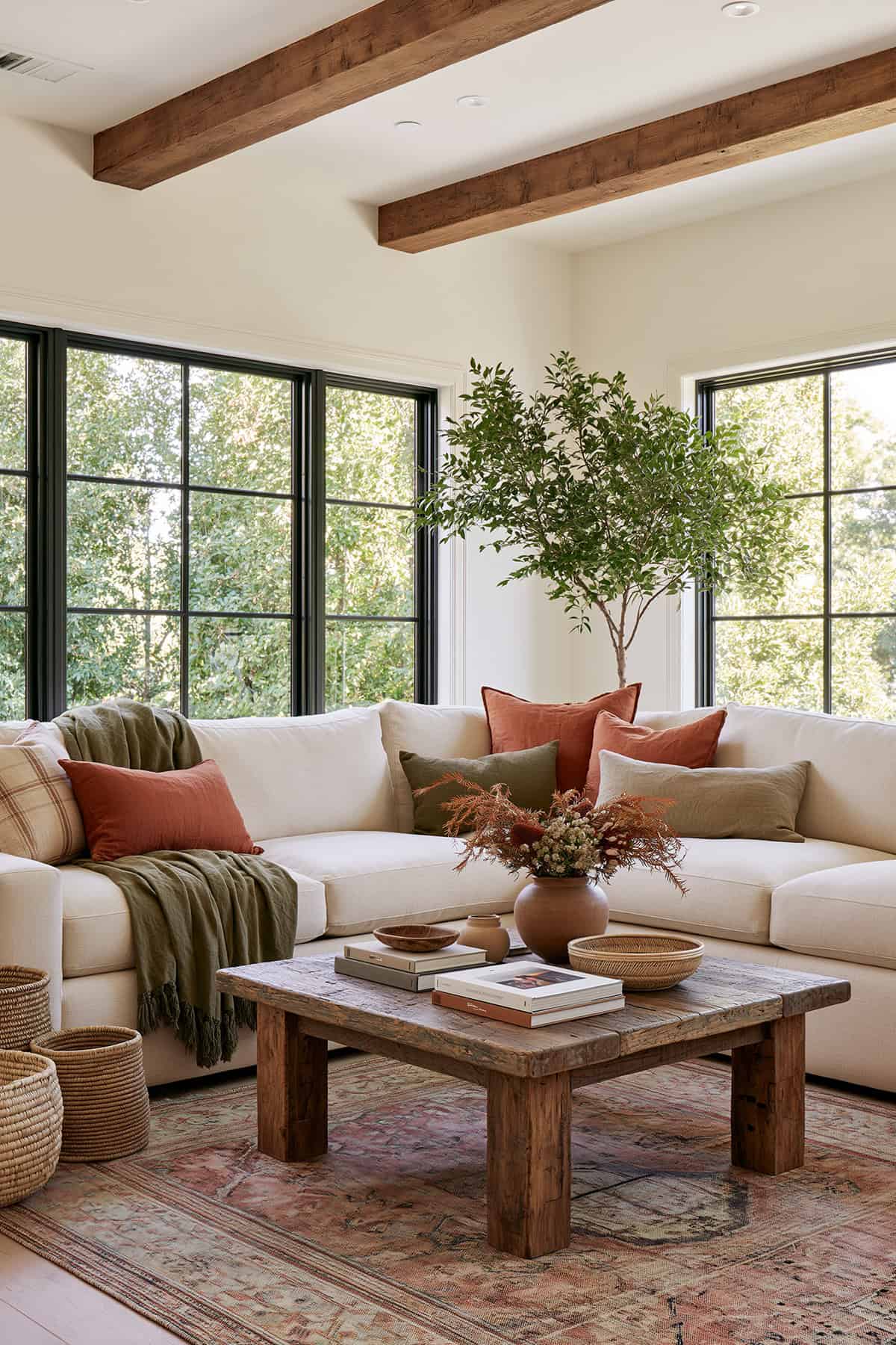 Earthy Living Room With Exposed Ceiling Beams